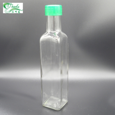 Clear square shape olive oil bottle