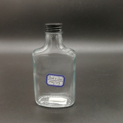 Botella de vidrio plano de 200 ml con tapa de tornillo
