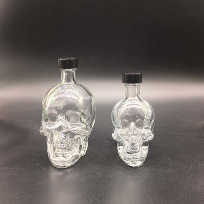 Skull shape glass bottle for wine synthetic cork